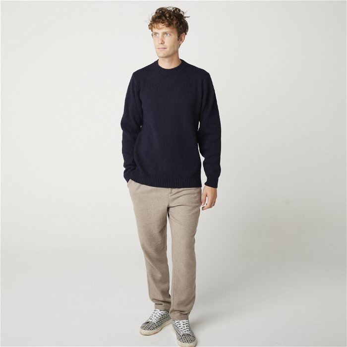 Image of model wearing Makers Stitch Jumper. Model is 6ft1in, chest size 38in and wearing size Medium