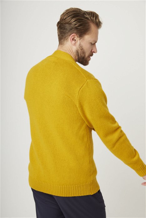 Image of model wearing Makers Stitch Cardigan. 