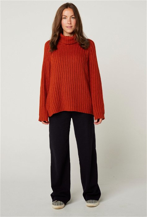Image of model wearing Stella Polo Neck Jumper. Model is 5ft8, size UK 8 and wearing size Small