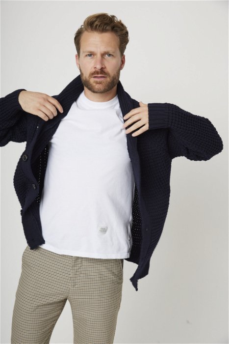 Image of model wearing Waffle Shawl Cardigan. Model is 6ft1in, chest size 38in and wearing size Large