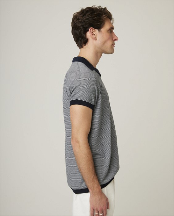 Image of model wearing Lynton Polo Shirt. 