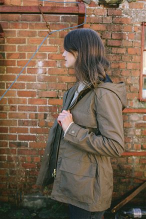 Image of model wearing Hybrid Jacket. Model is 5ft10, size UK 8 and wearing size Small