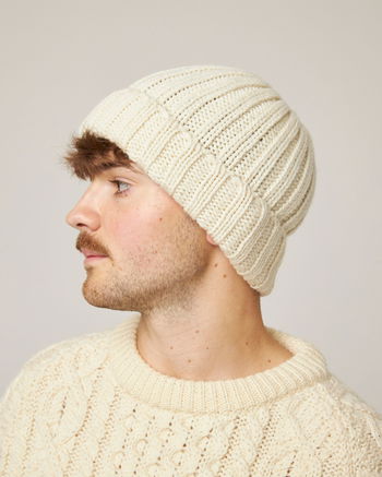 Image of model wearing Ribbed Beanie. One Size