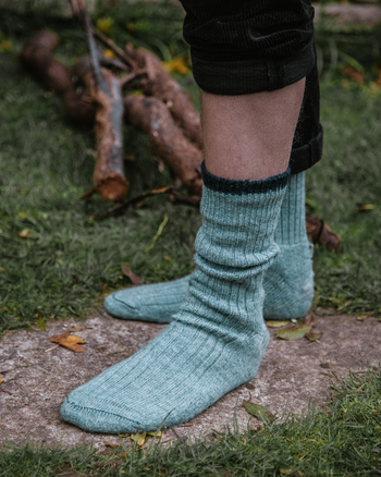 Image of model wearing Boot Socks. Small - UK4-7/ Large - UK 8-12