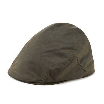 Image of model wearing Wax Flat Cap. 