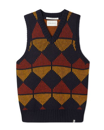 Image of model wearing Peak Sweater Vest. 