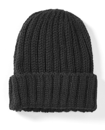 Image of model wearing Ribbed Beanie. One Size