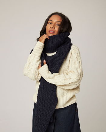 Image of model wearing Oversized Scarf. One Size