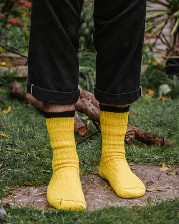 Image of model wearing Boot Socks. Small - UK4-7/ Large - UK 8-12