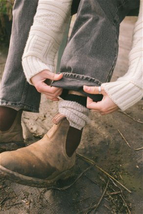 Image of model wearing Boot Socks. 