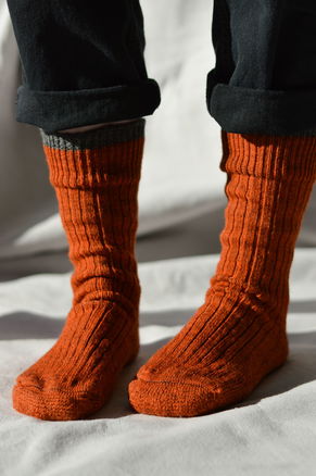 Image of model wearing Boot Socks. Small - UK4-7/ Large - UK 8-12