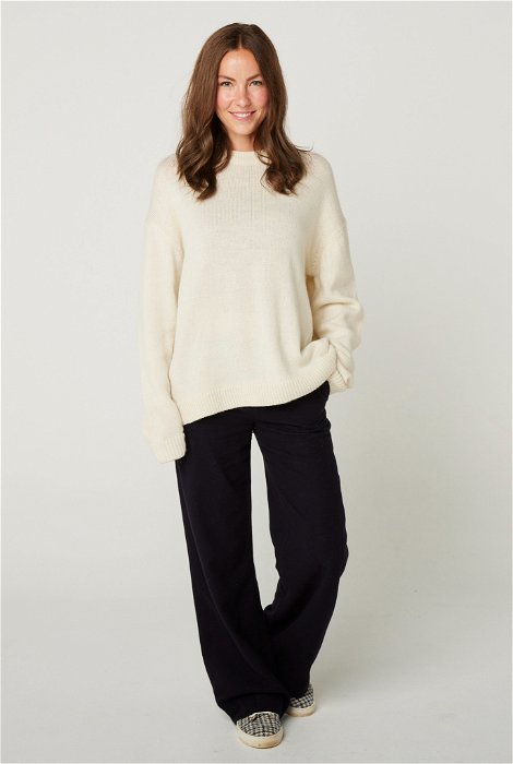 Image of model wearing Riley Crew Jumper. Model is 5ft8, size UK 8 and wearing size Small
