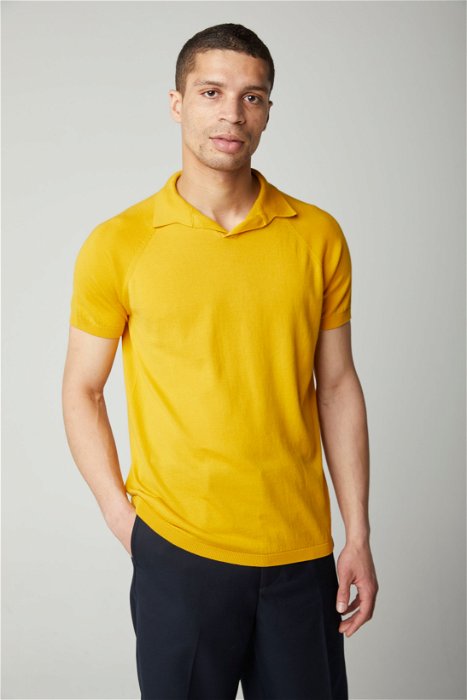 Image of model wearing Knitted Emery Polo Shirt. Model is 6ft, chest size 36in and wearing size Medium