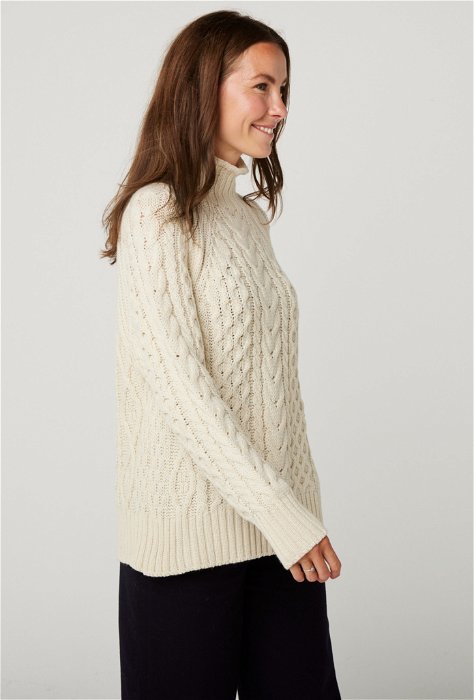 Image of model wearing Sophie Cable Knit Jumper. Model is 5ft8, size UK 8 and wearing size Small