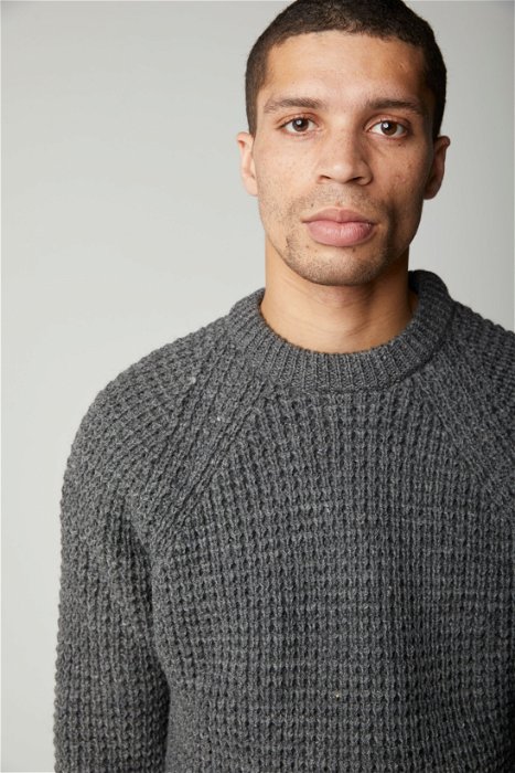 Image of model wearing Waffle Crew Neck Jumper. Model is 6ft, chest size 36in and wearing size Medium