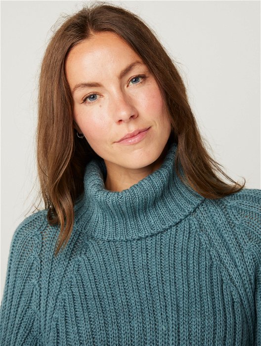 Image of model wearing Stella Polo Neck Jumper. Model is 5ft8, size UK 8 and wearing size Small