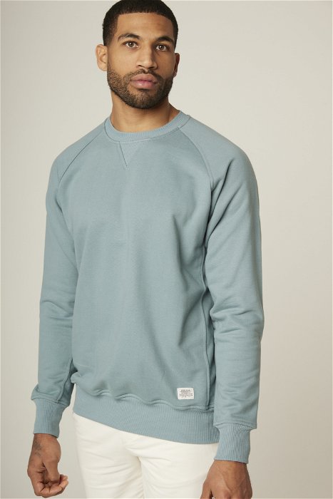 Image of model wearing Classic Sweatshirt. Model is 6ft, chest size 36in and wearing size Large