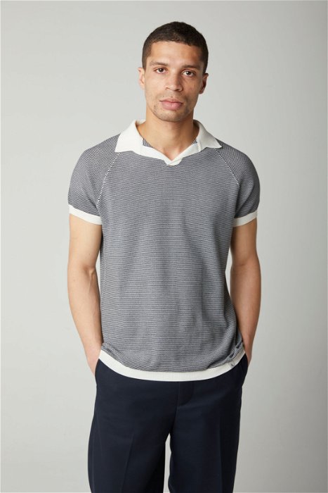 Image of model wearing Lynton Polo Shirt. Model is 6ft, chest size 36in and wearing size Medium