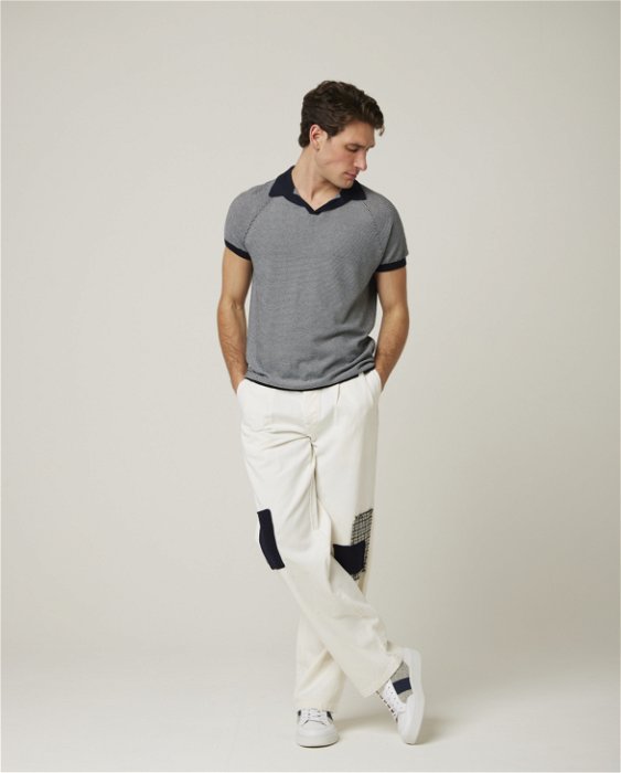 Image of model wearing Lynton Polo Shirt. 