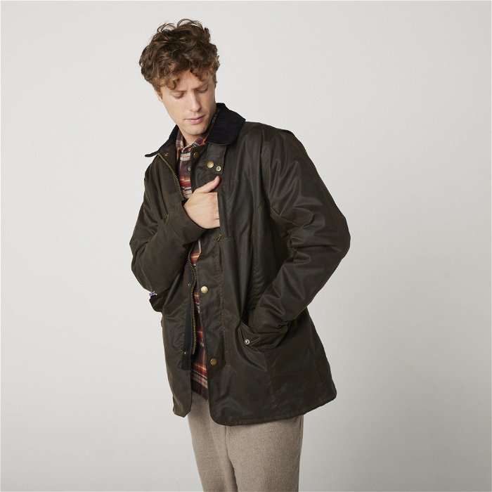 Image of model wearing Wax Clifton Jacket. Model is 6ft1in, chest size 38in and wearing size Large