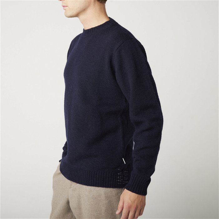 Image of model wearing Makers Stitch Jumper. Model is 6ft1in, chest size 38in and wearing size Medium