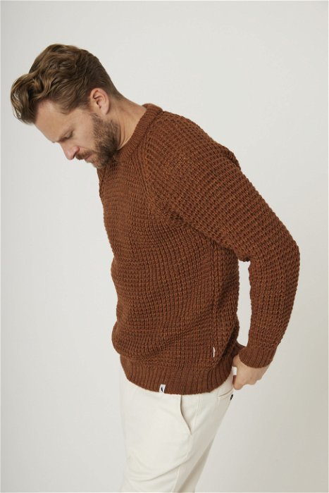Image of model wearing Waffle Crew Neck Jumper. Model is 6ft1in, chest size 38in and wearing size Medium