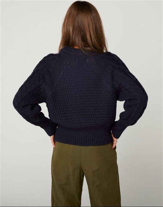 Image of model wearing Isobel Aran Jumper. Model is 5ft8, size UK 8 and wearing size Small