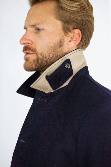 Image of model wearing Bonded Wool Mac. Model is 6ft1in, chest size 40in and wearing size Large