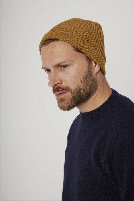 Image of model wearing Porter Ribbed Beanie. One Size 