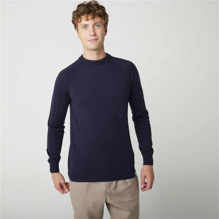 Image of model wearing Beauford Crew Jumper. Model is 6ft1in, chest size 38in and wearing size Large.