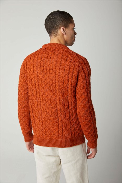 Image of model wearing Hudson Aran Jumper. Model is 6ft, chest size 36in and wearing size Medium