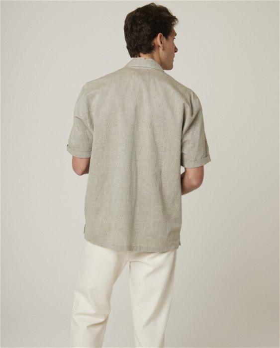 Image of model wearing Linen Short Sleeve Shirt . 