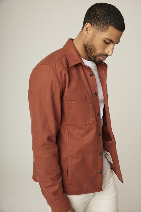 Image of model wearing Sennan Overshirt. Model is 6ft1in, chest size 38in and wearing size Large