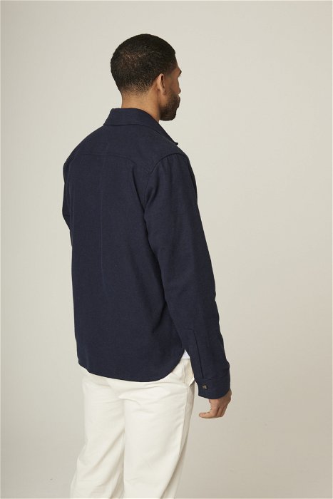 Image of model wearing Sennan Overshirt. Model is 6ft1in, chest size 38in and wearing size Large