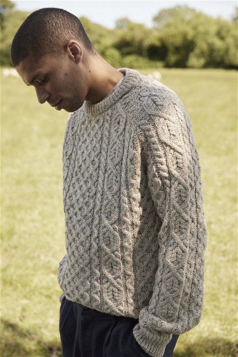 Image of model wearing Hudson Aran Jumper. Model is 6ft, chest size 36in and wearing size Large