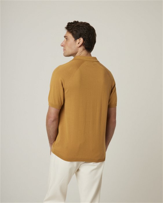 Image of model wearing Emery Polo Shirt 2.0. 